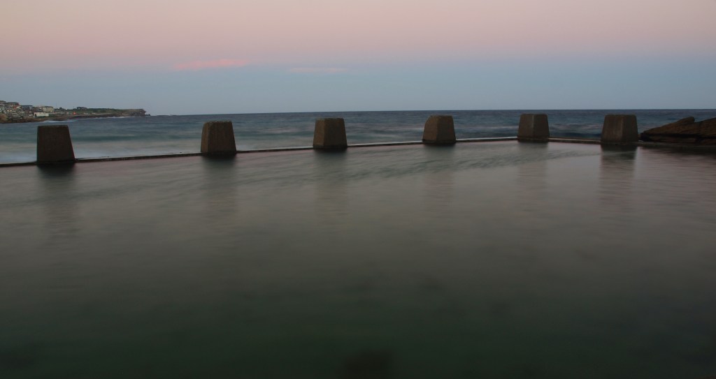 Glassy water at sunset